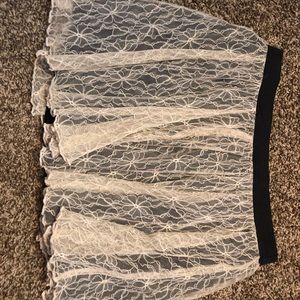 Black skirt with cream colored lace overlay